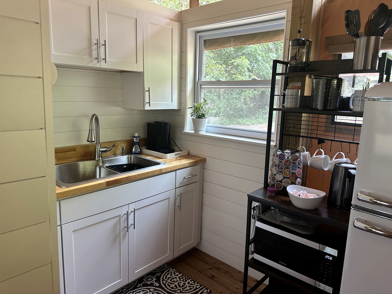 Mistletoe kitchenette — white shaker cabinets, butcher block counter