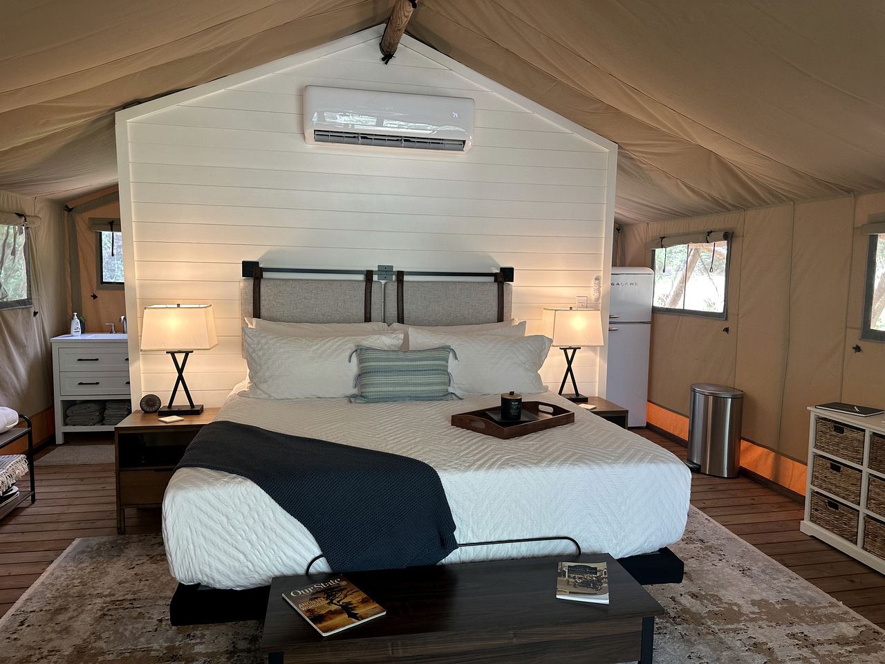 King bed inside Mistletoe — wide view of the canvas interior